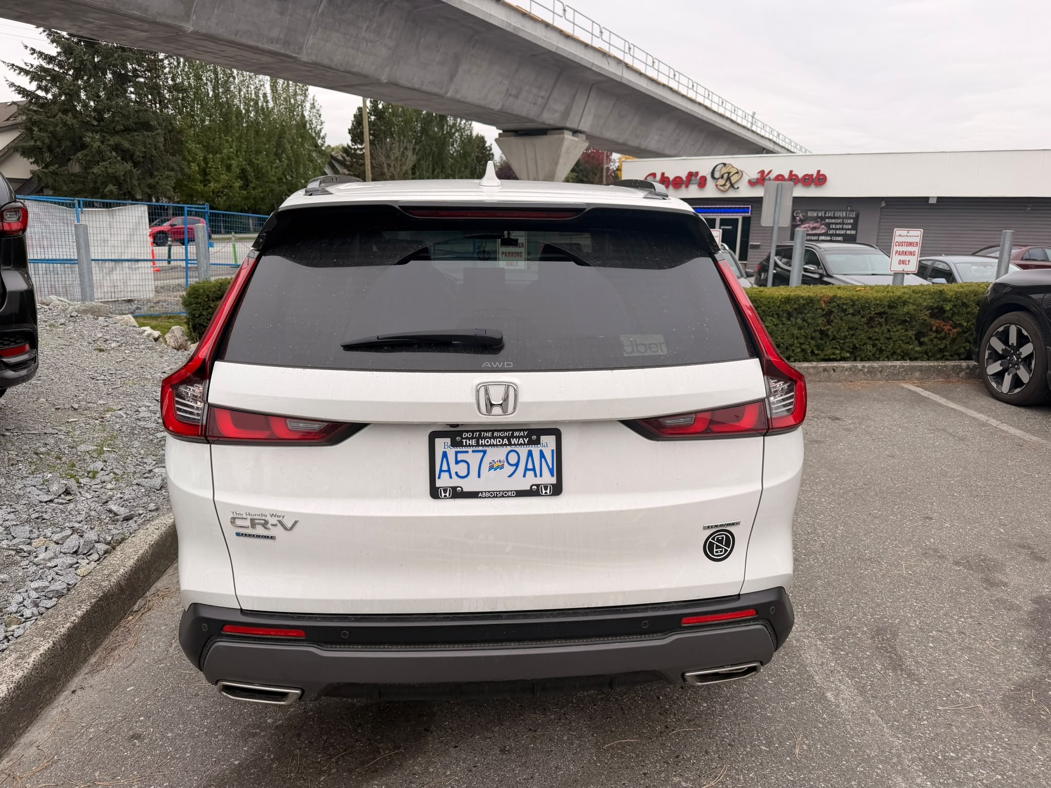 Снимка 4 от търг – 2024 HONDA CR-V HYBRID TOURING с VIN 2HKRS6H98RH208621