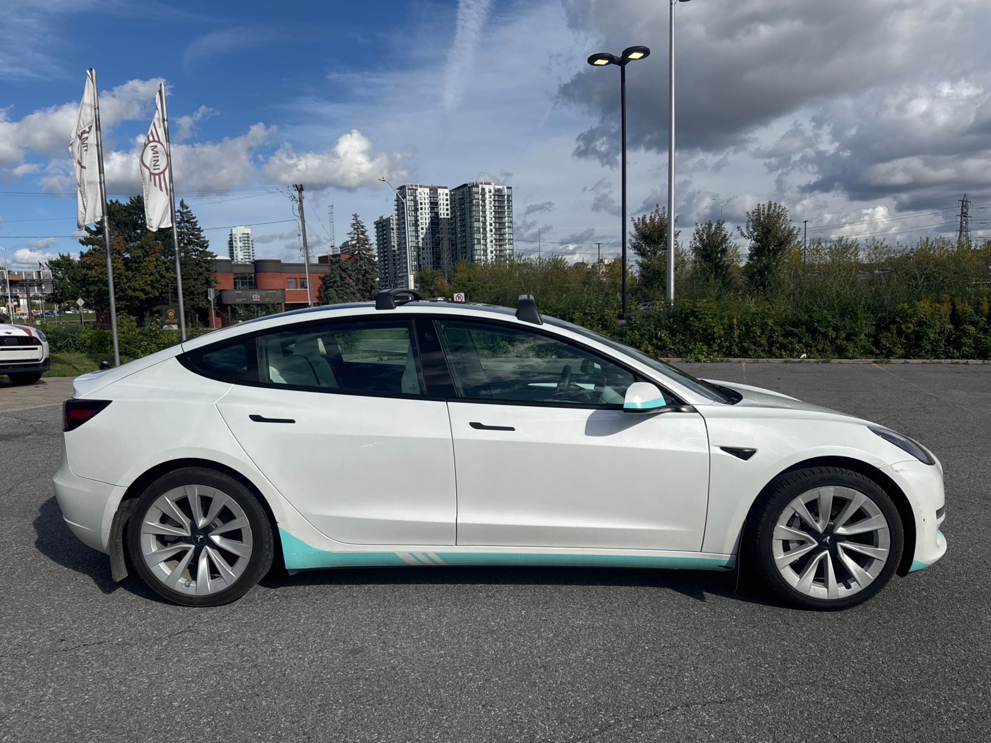 Photo 3 from auction – 2021 TESLA MODEL 3 STANDARD RANGE with VIN 5YJ3E1EAXMF080338