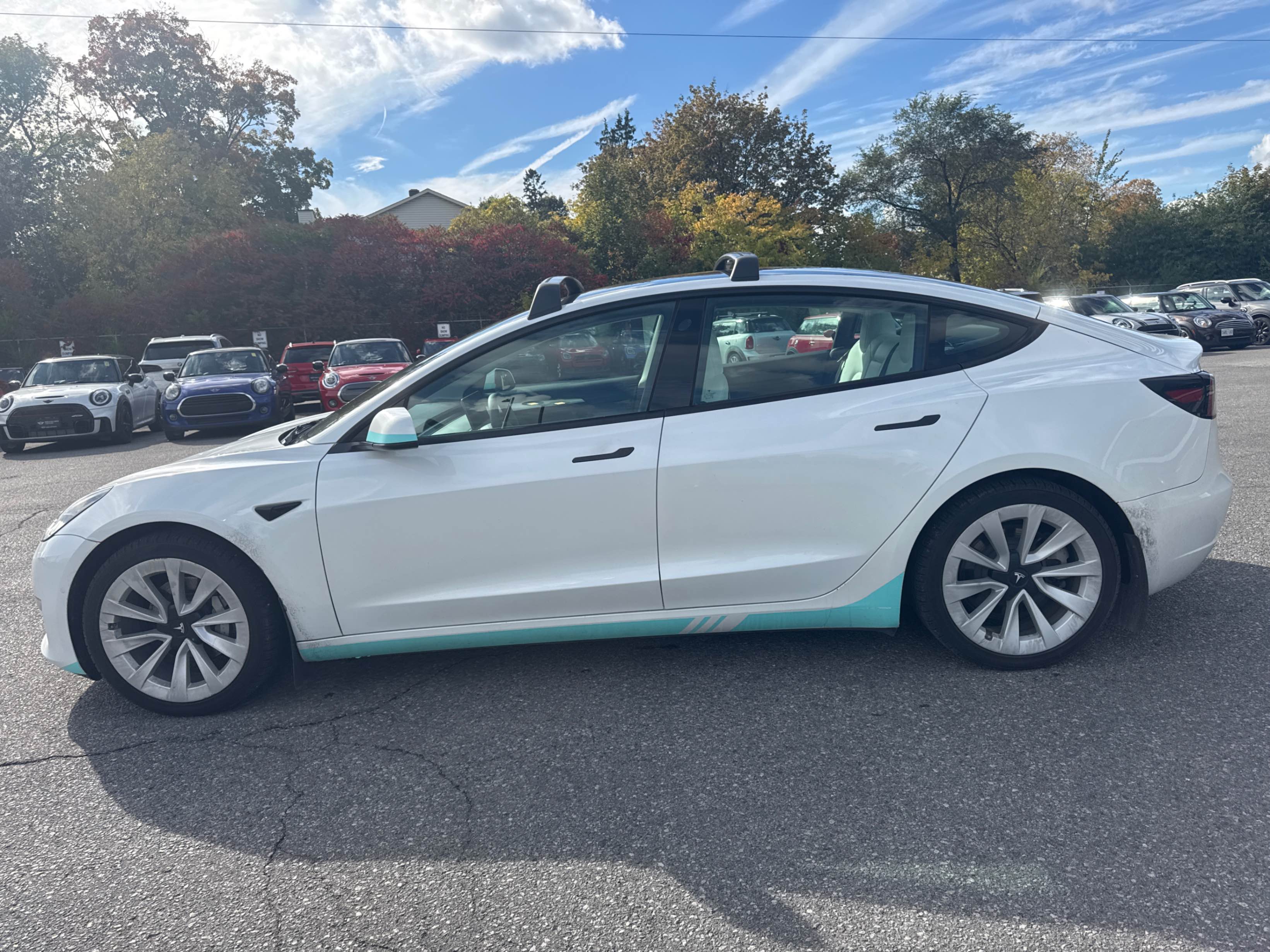 Photo 2 from auction – 2021 TESLA MODEL 3 STANDARD RANGE with VIN 5YJ3E1EAXMF080338