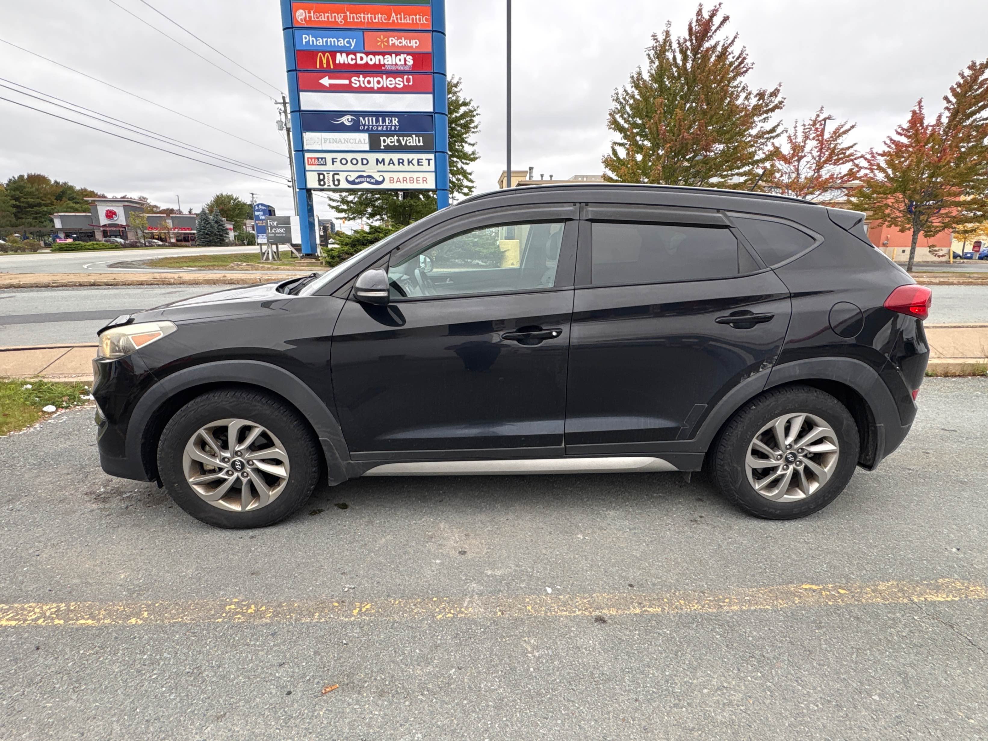 Photo 2 from auction – 2017 HYUNDAI TUCSON SE with VIN KM8J3CA47HU316784