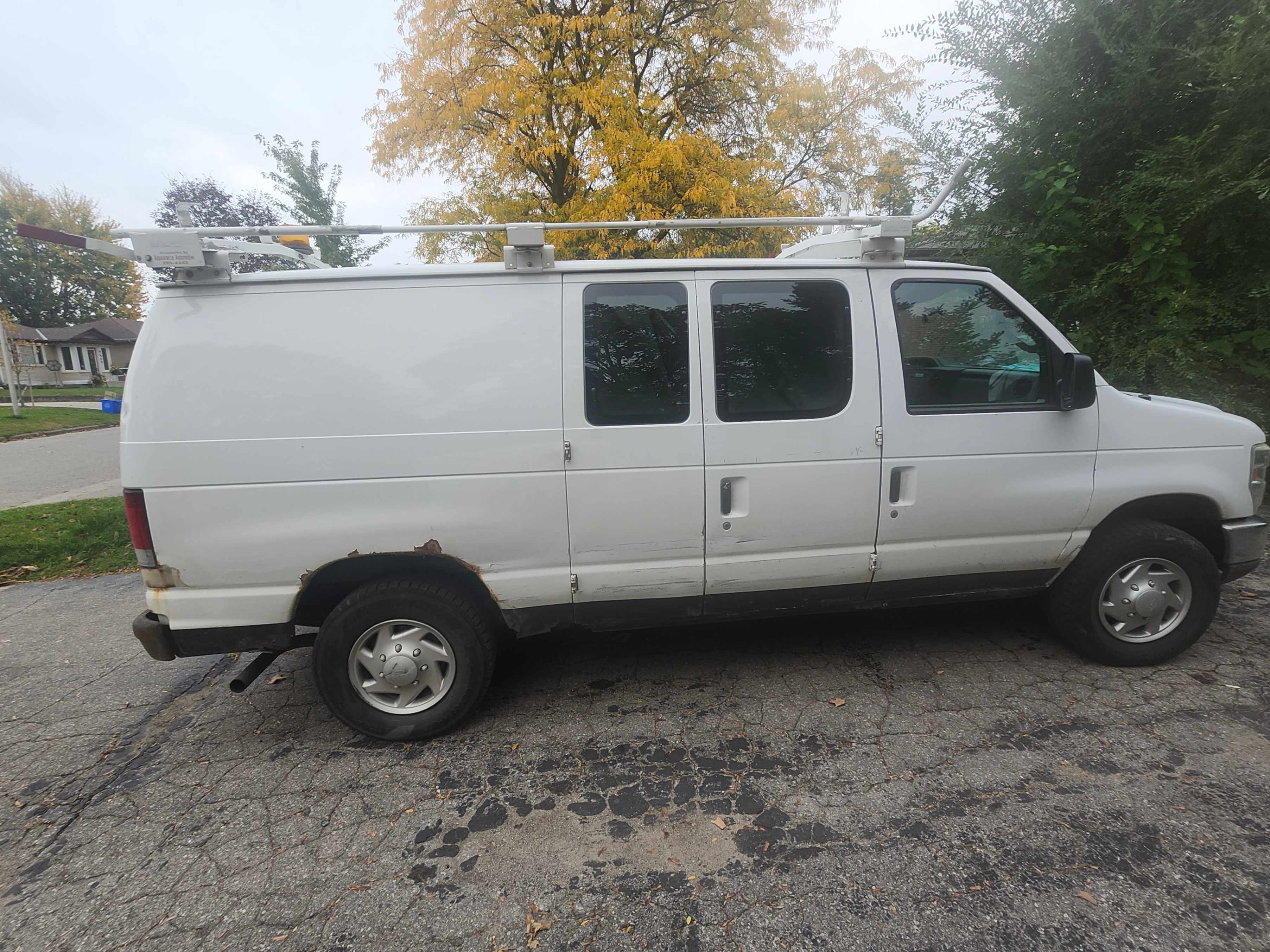 Photo 3 from auction – 2011 FORD ECONOLINE CARGO VAN COMMERCIAL with VIN 1FTNE2EW2BDA92143