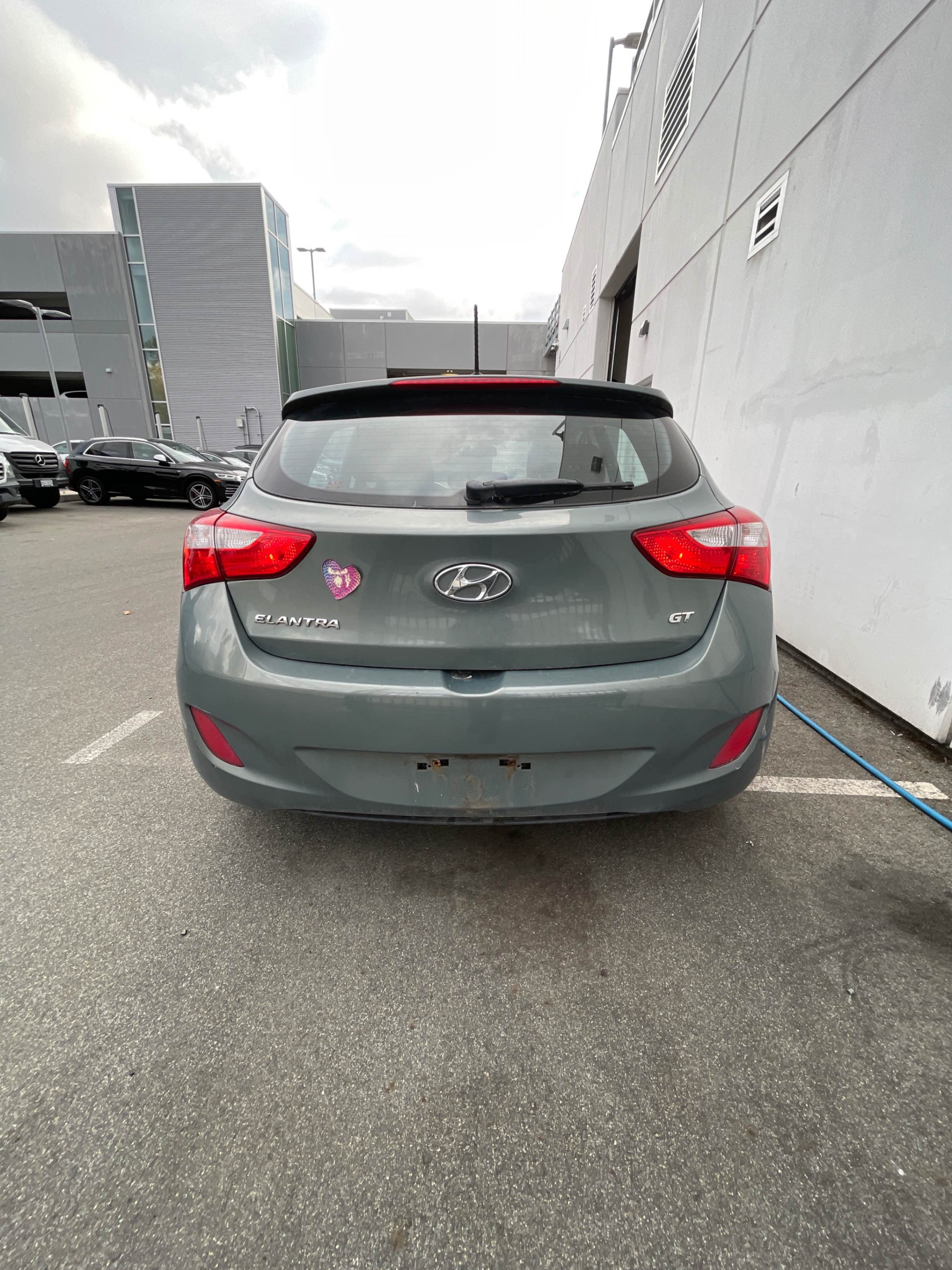 Снимка 4 от търг – 2013 HYUNDAI ELANTRA GT GLS с VIN KMHD35LE2DU144625