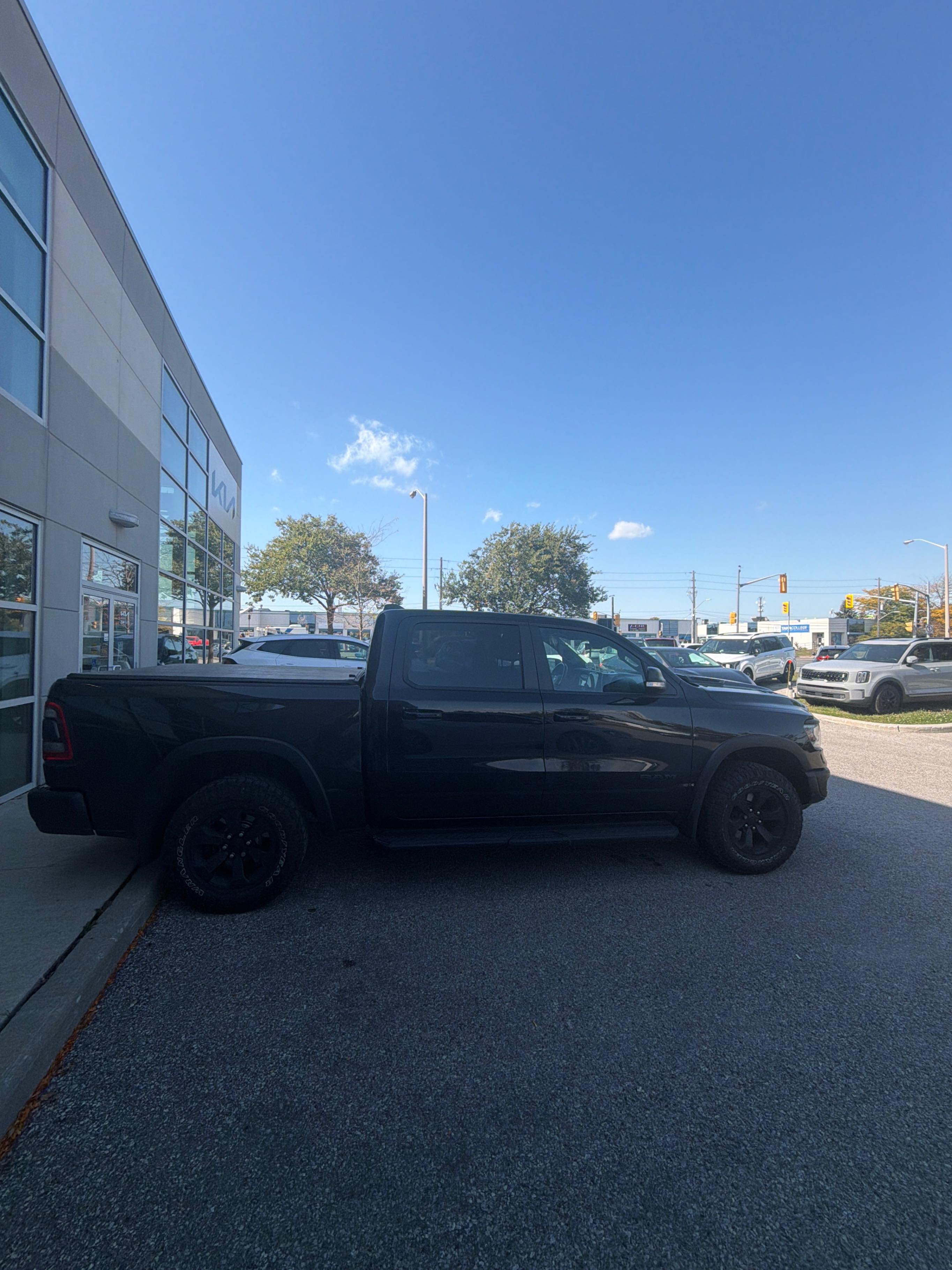 Photo 3 from auction – 2022 RAM 1500 REBEL with VIN 1C6SRFLT5NN472476
