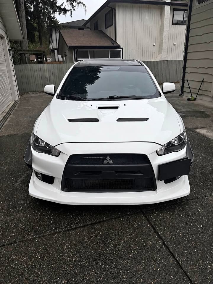MITSUBISHI LANCER EVOLUTION GSR 2010 with VIN JA32W8FV1AU602410 - Photo from auction