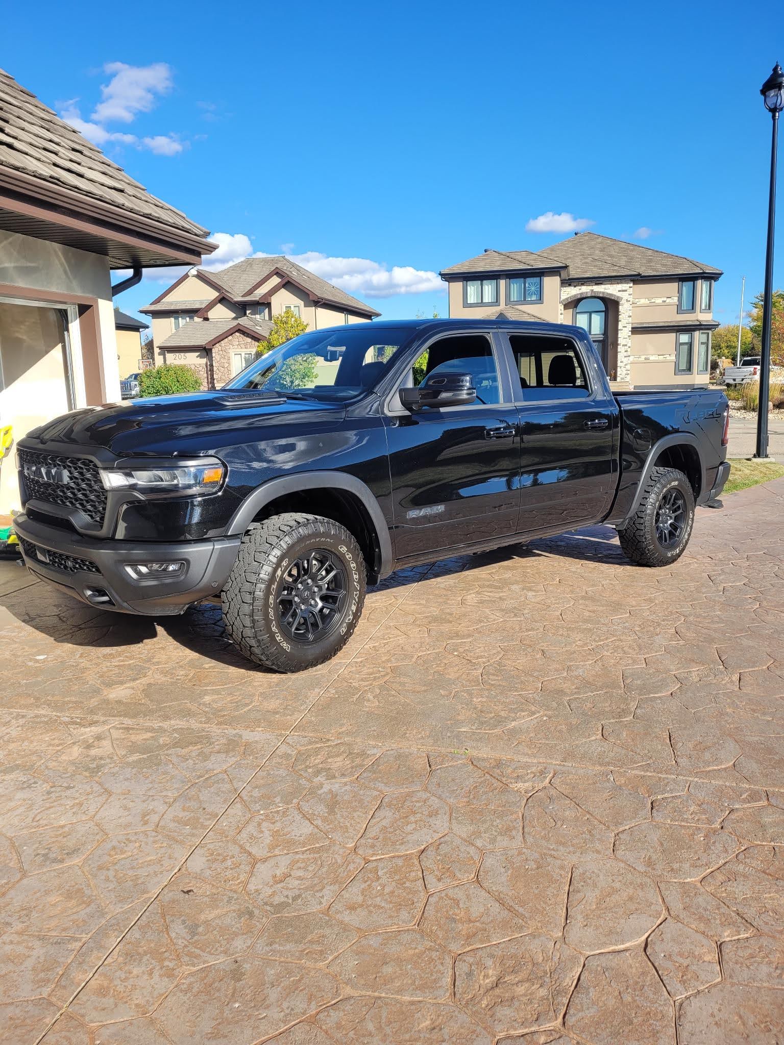 RAM 1500 REBEL 2025 with VIN 1C6SRFLP2SN595327 - Photo from auction