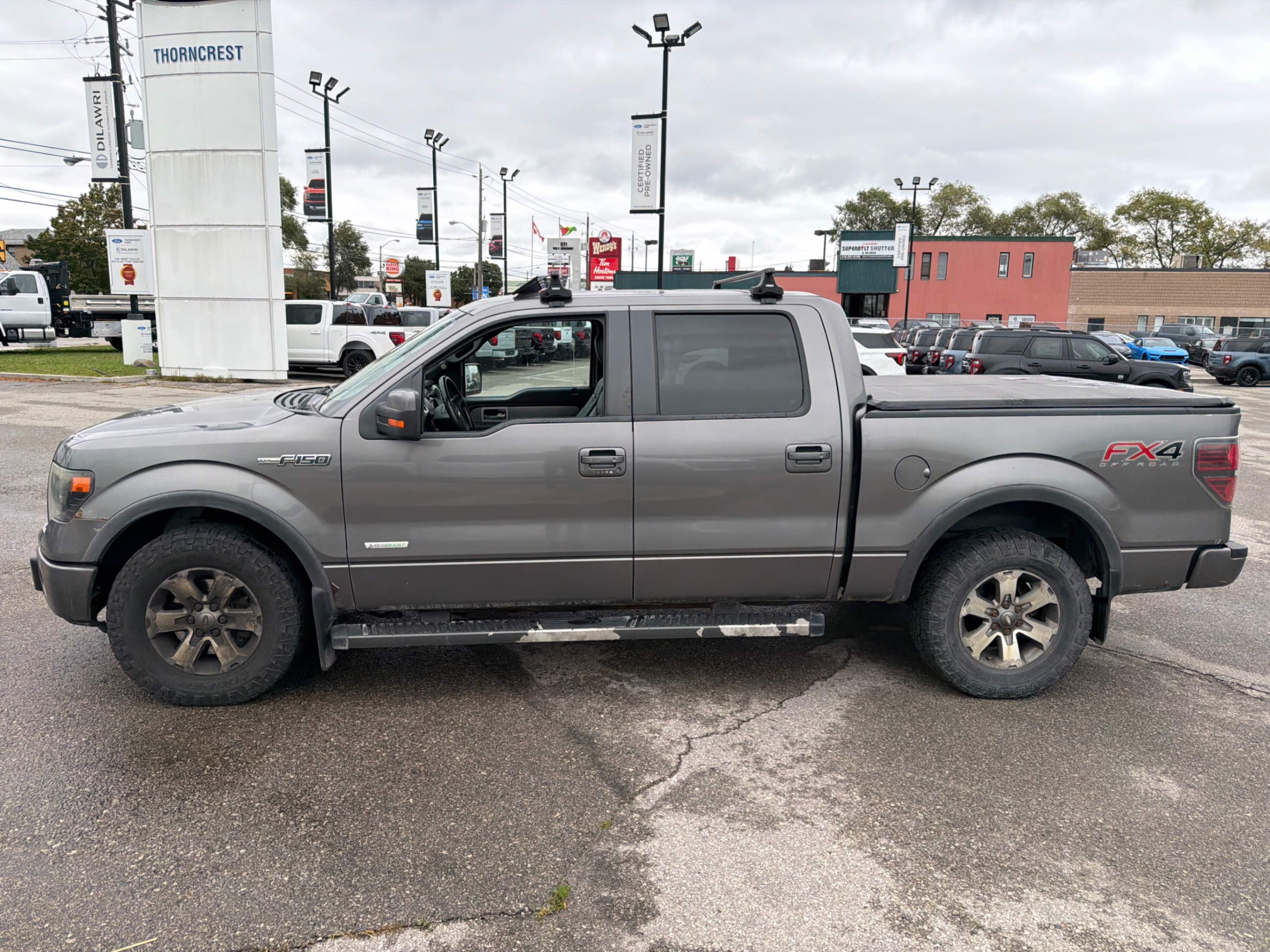 Снимка 2 от търг – 2013 FORD F-150 4WD SUPERCREW с VIN 1FTFW1ET9DKF45304