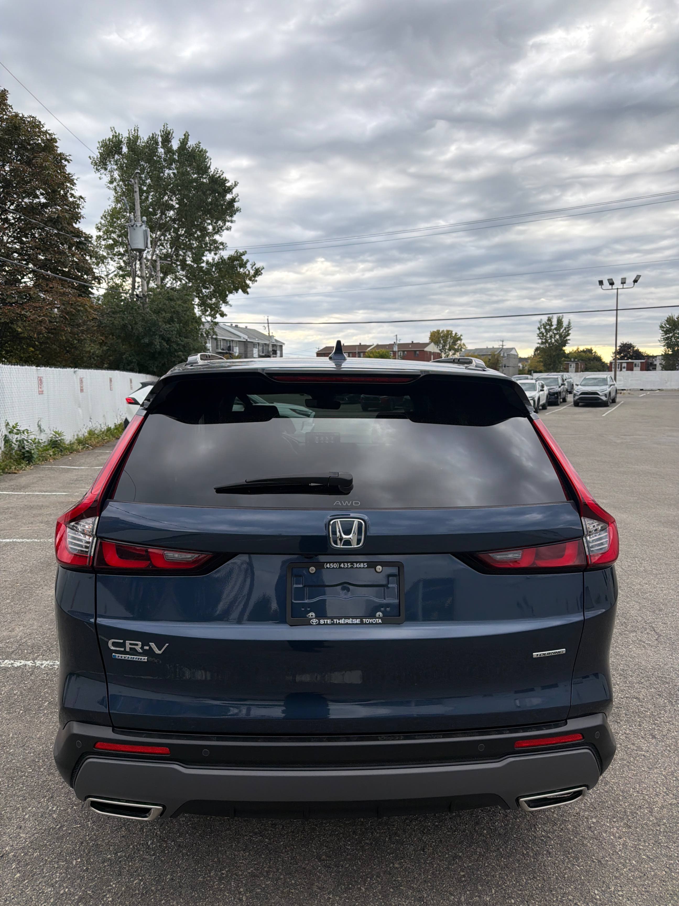 Снимка 4 от търг – 2023 HONDA CR-V HYBRID TOURING с VIN 2HKRS6H96PH201776