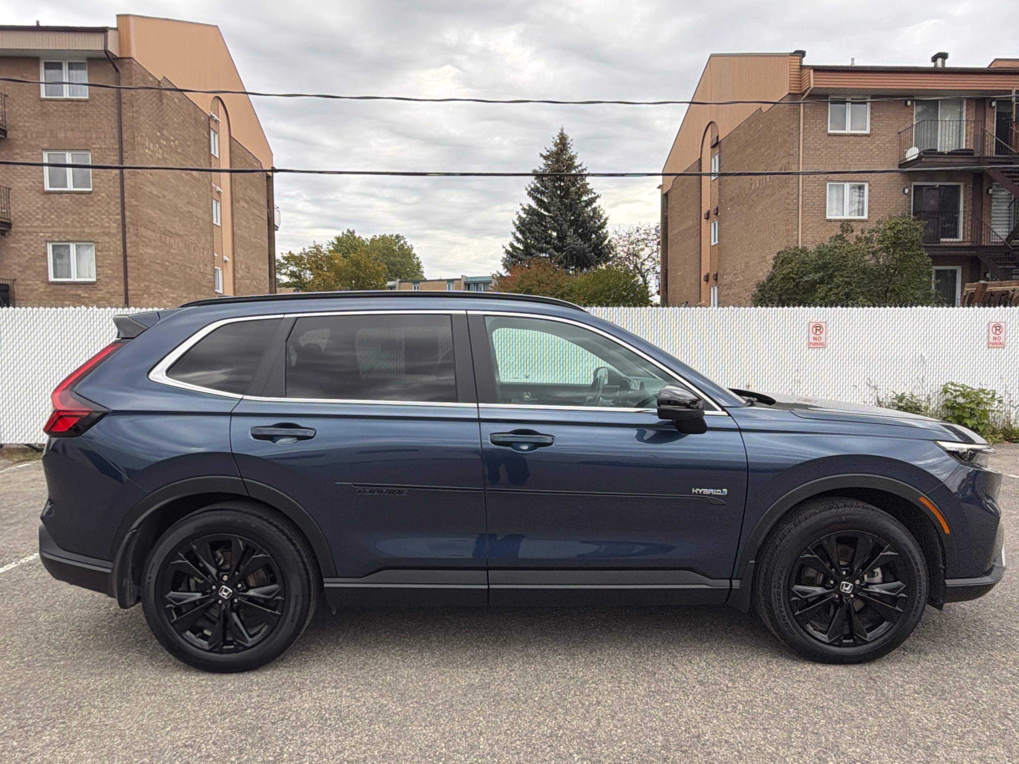 Снимка 3 от търг – 2023 HONDA CR-V HYBRID TOURING с VIN 2HKRS6H96PH201776