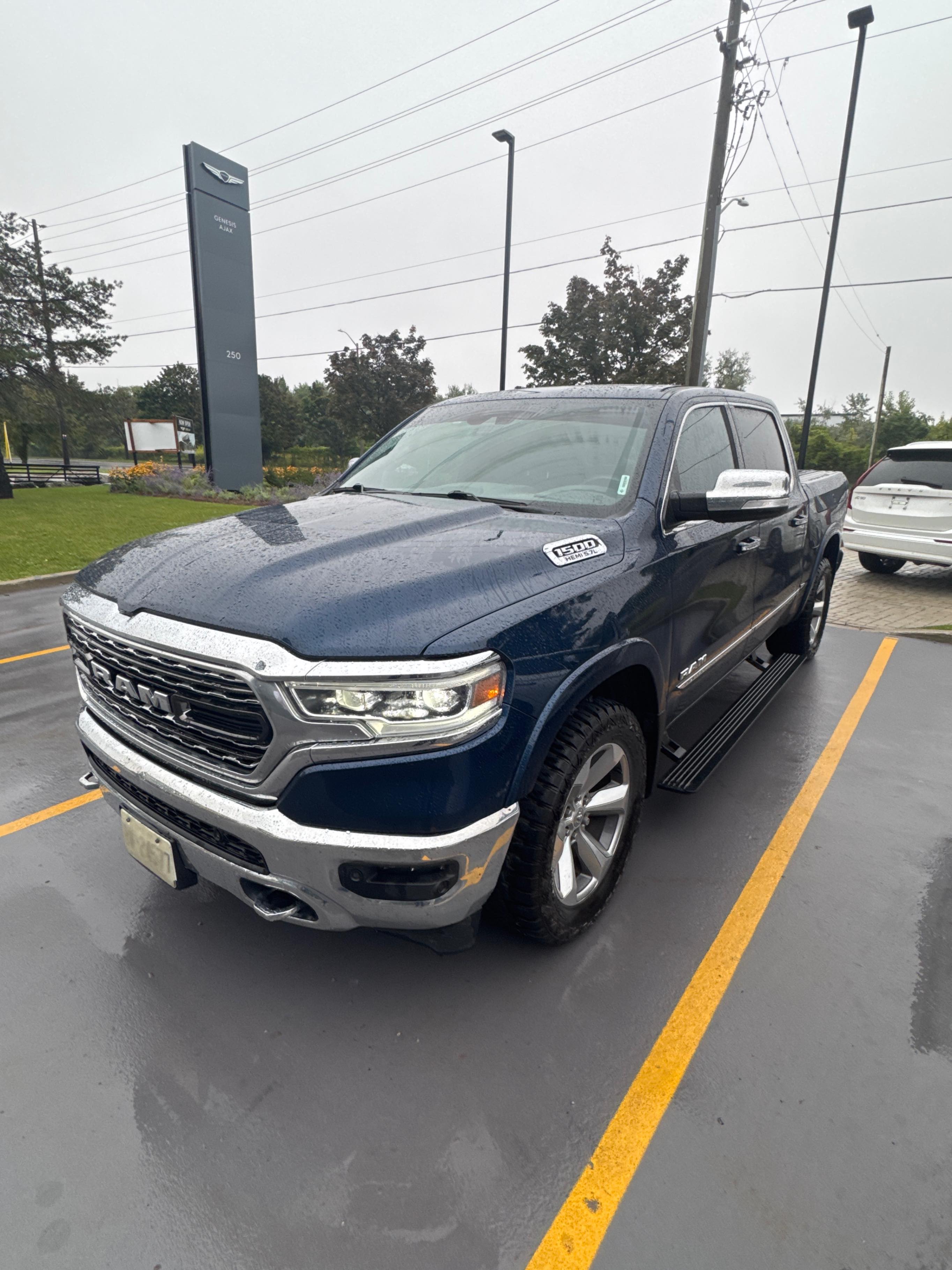 RAM 1500 LIMITED 2020 with VIN 1C6SRFHT6LN320034 - Photo from auction