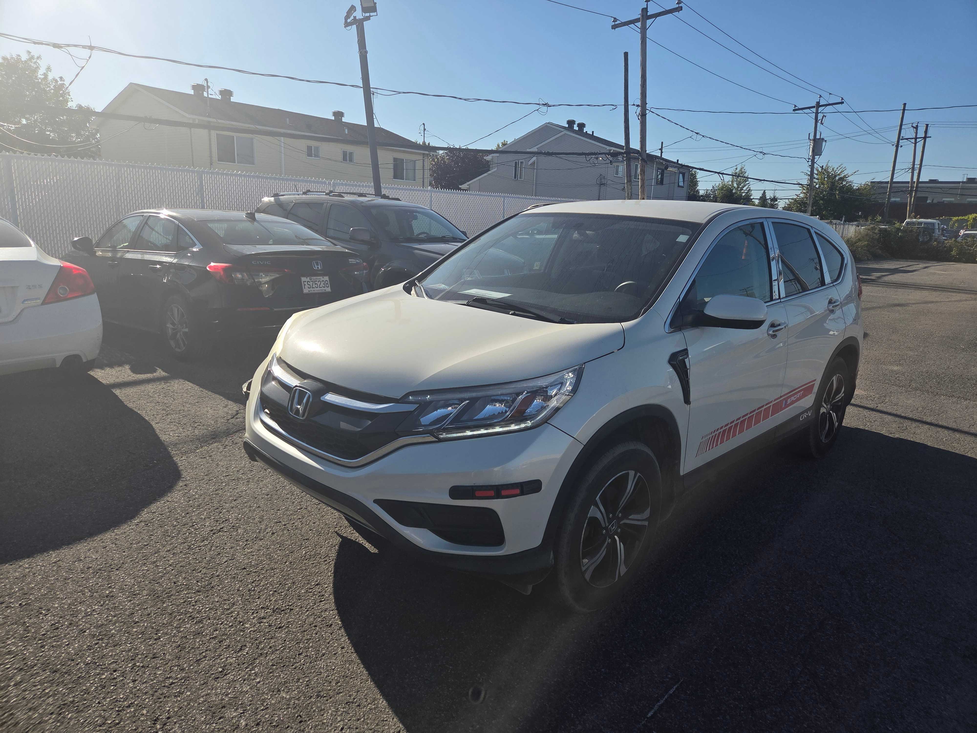 HONDA CR-V SE 2015 with VIN 2HKRM4H45FH125064 - Photo from auction
