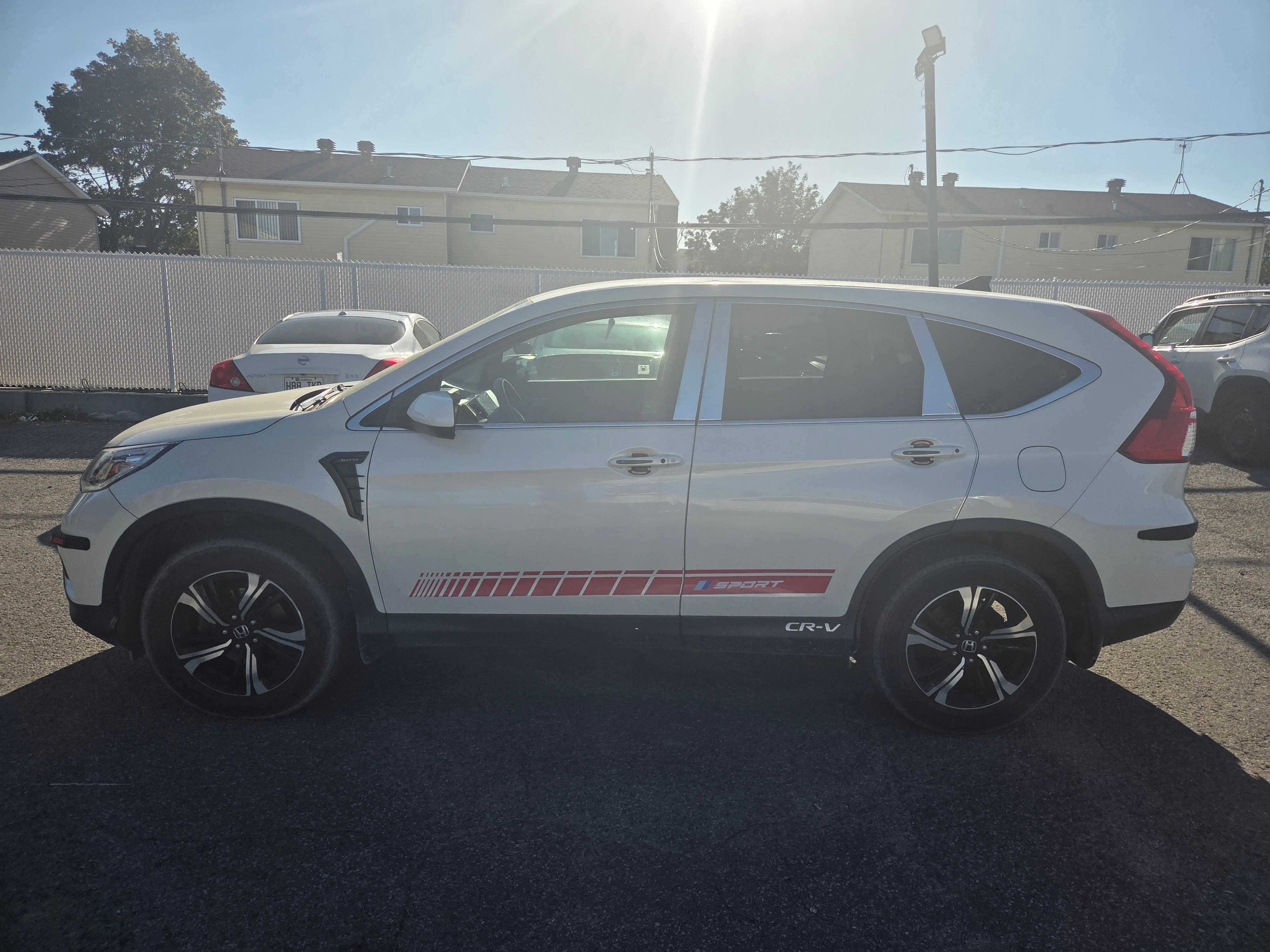 Photo 2 from auction – 2015 HONDA CR-V SE with VIN 2HKRM4H45FH125064