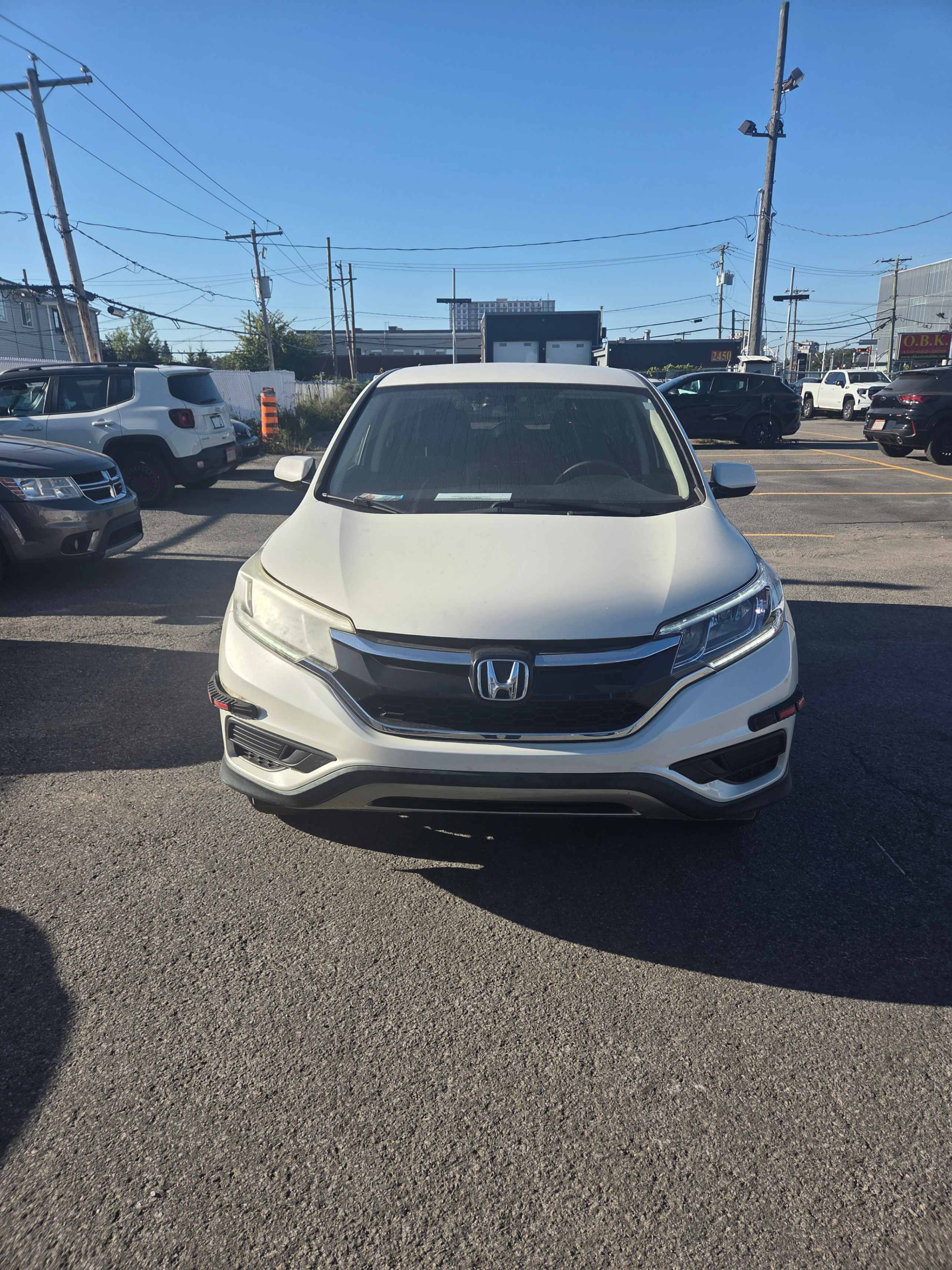 Photo 6 from auction – 2015 HONDA CR-V SE with VIN 2HKRM4H45FH125064