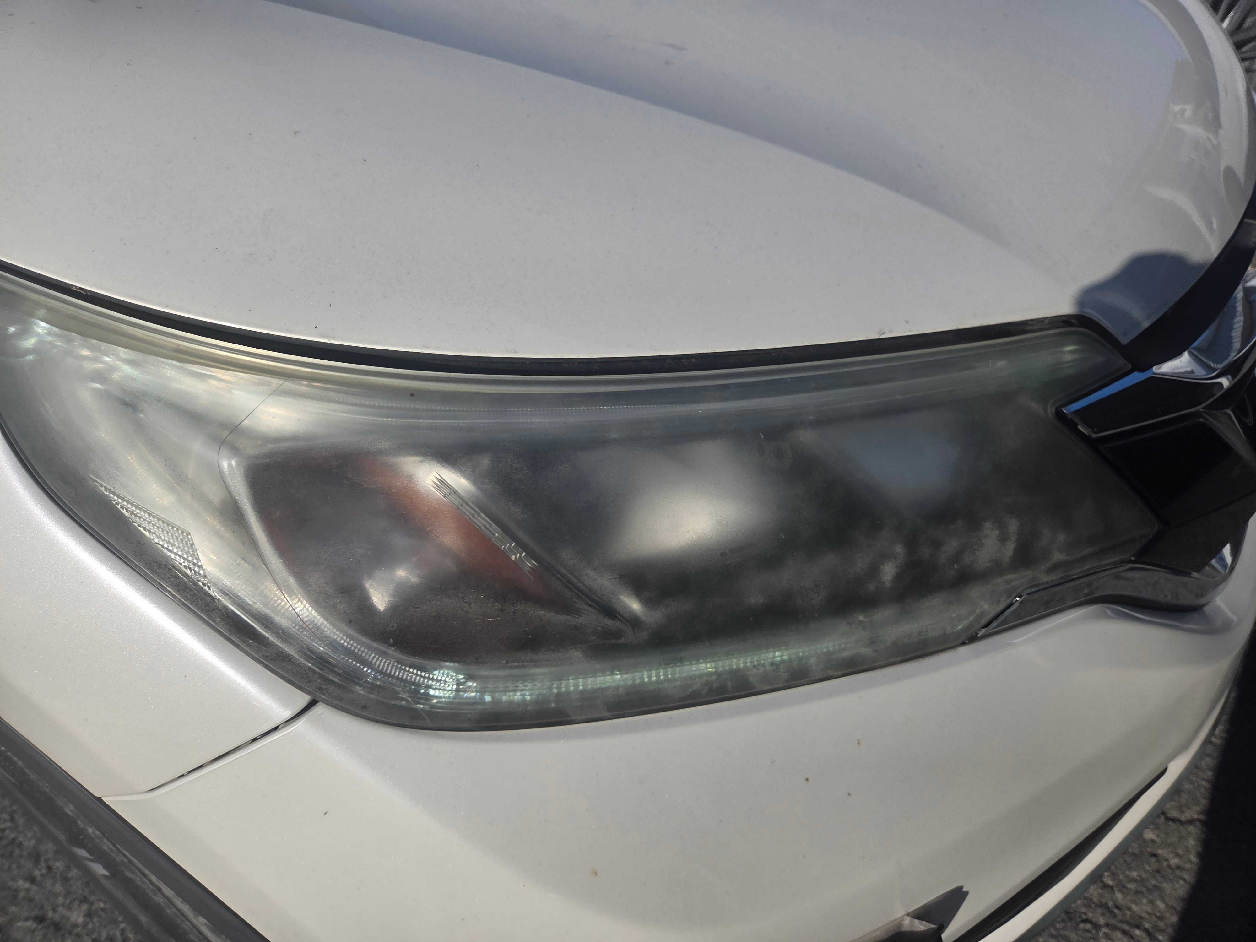 Photo 11 from auction – 2015 HONDA CR-V SE with VIN 2HKRM4H45FH125064