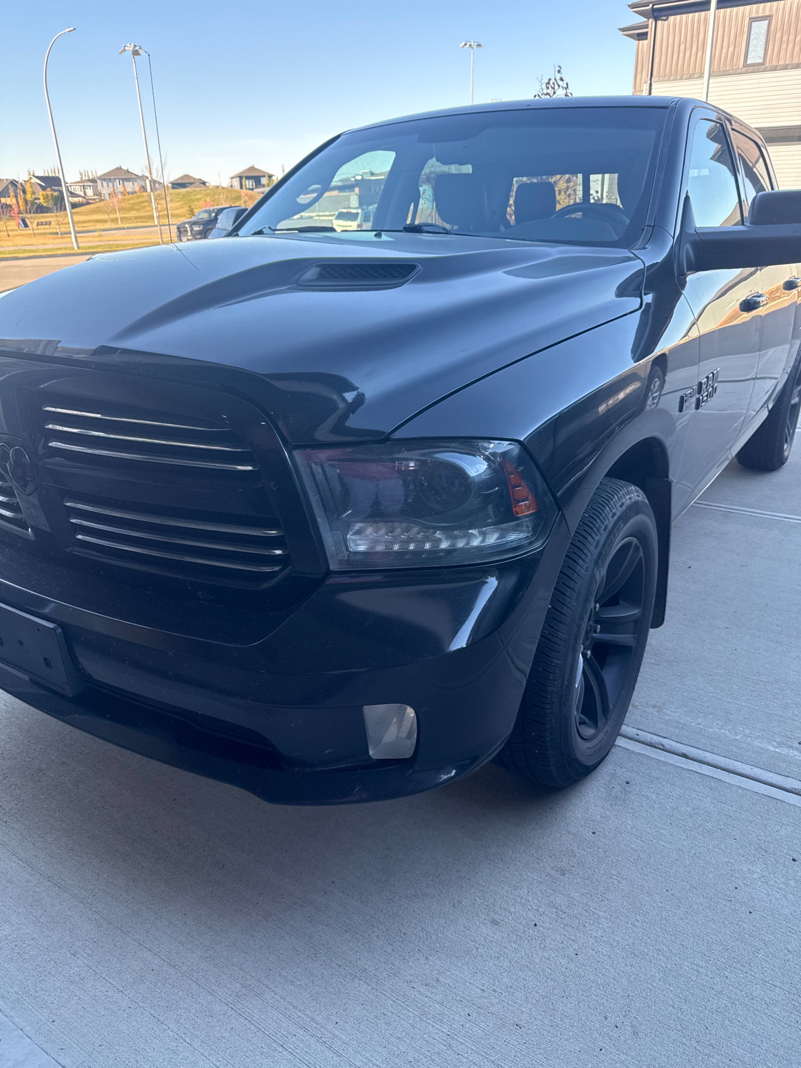 RAM 1500 SPORT 2015 with VIN 1C6RR7MT1FS767449 - Photo from auction